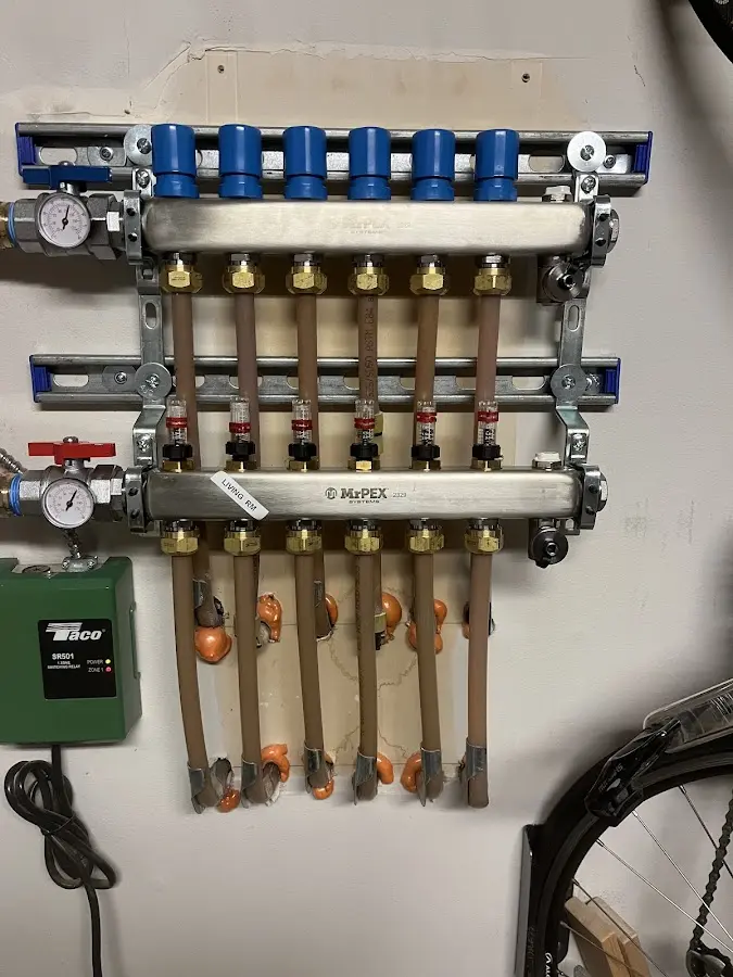 Plumber performing Leak Detection at a residential property in Forest City